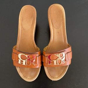 Tan coach cork wedges